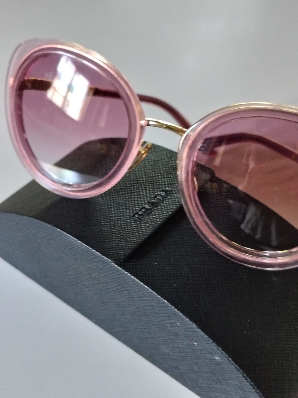 Prada Pink Round Frame Sunglasses with Gold Bridge